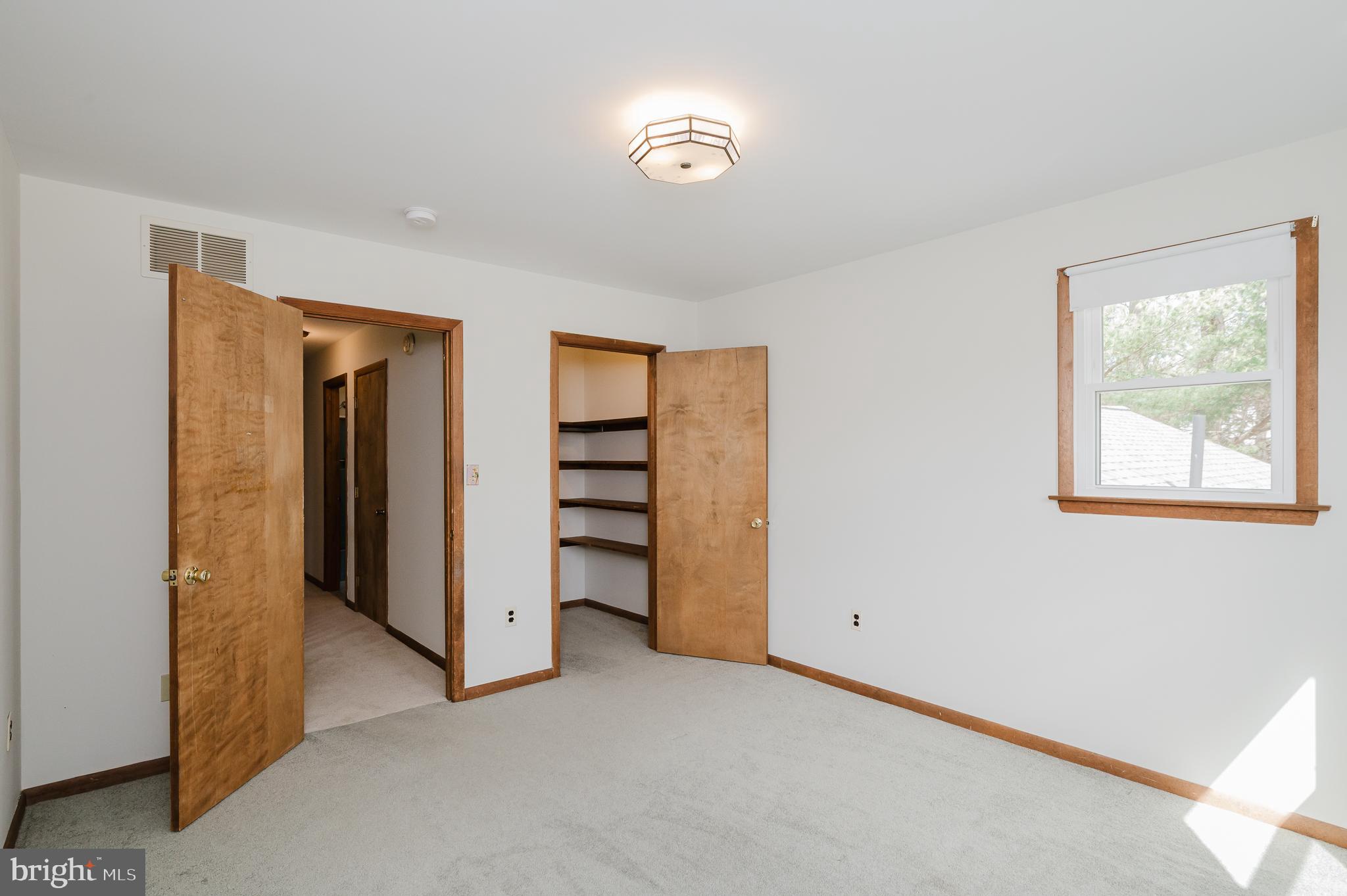 2713 Garrett Road White Hall, MD 21161 - Photo 36 of 60 a view of room with closet and windows