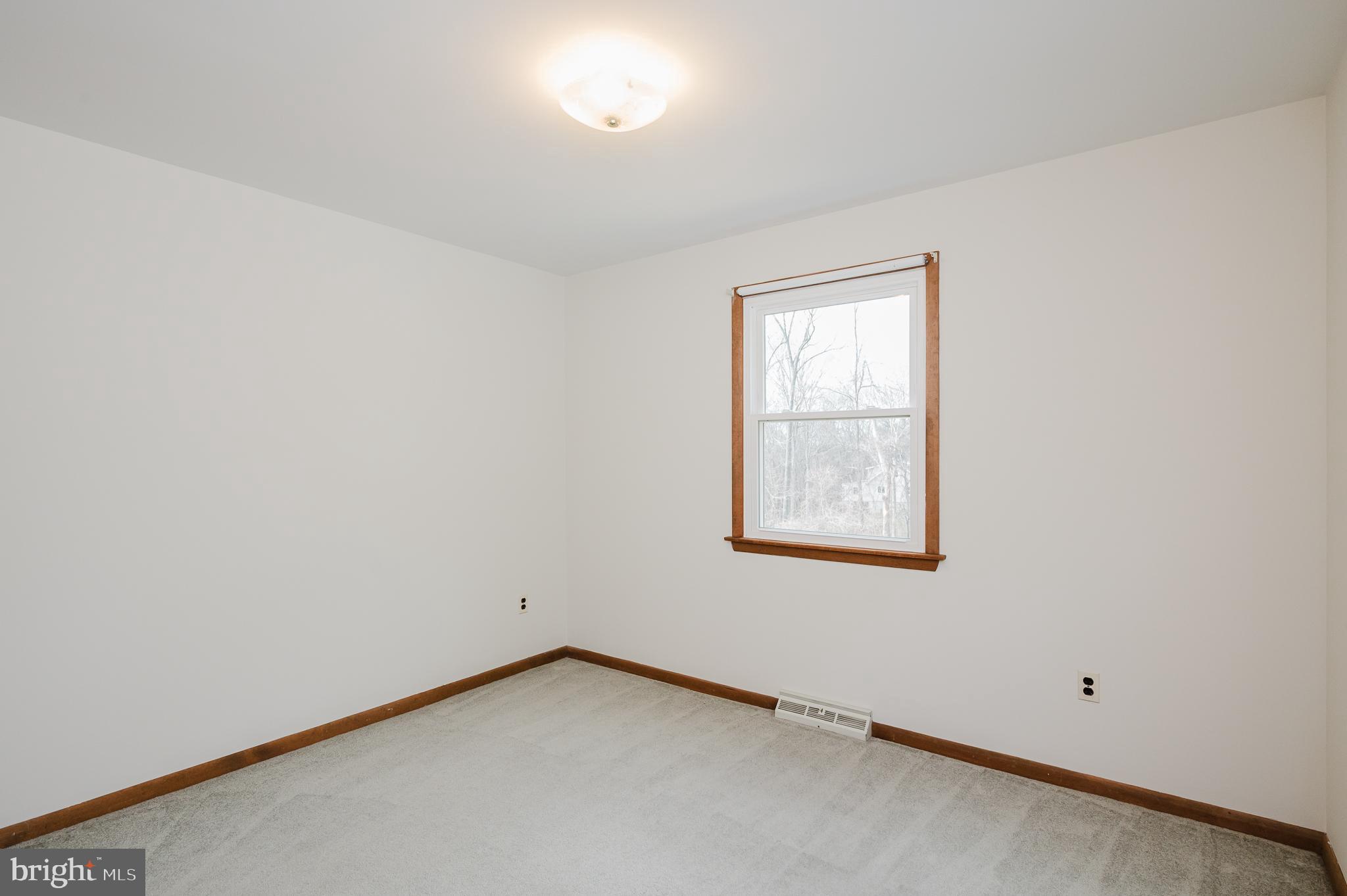 2713 Garrett Road White Hall, MD 21161 - Photo 42 of 60 an empty room with a window