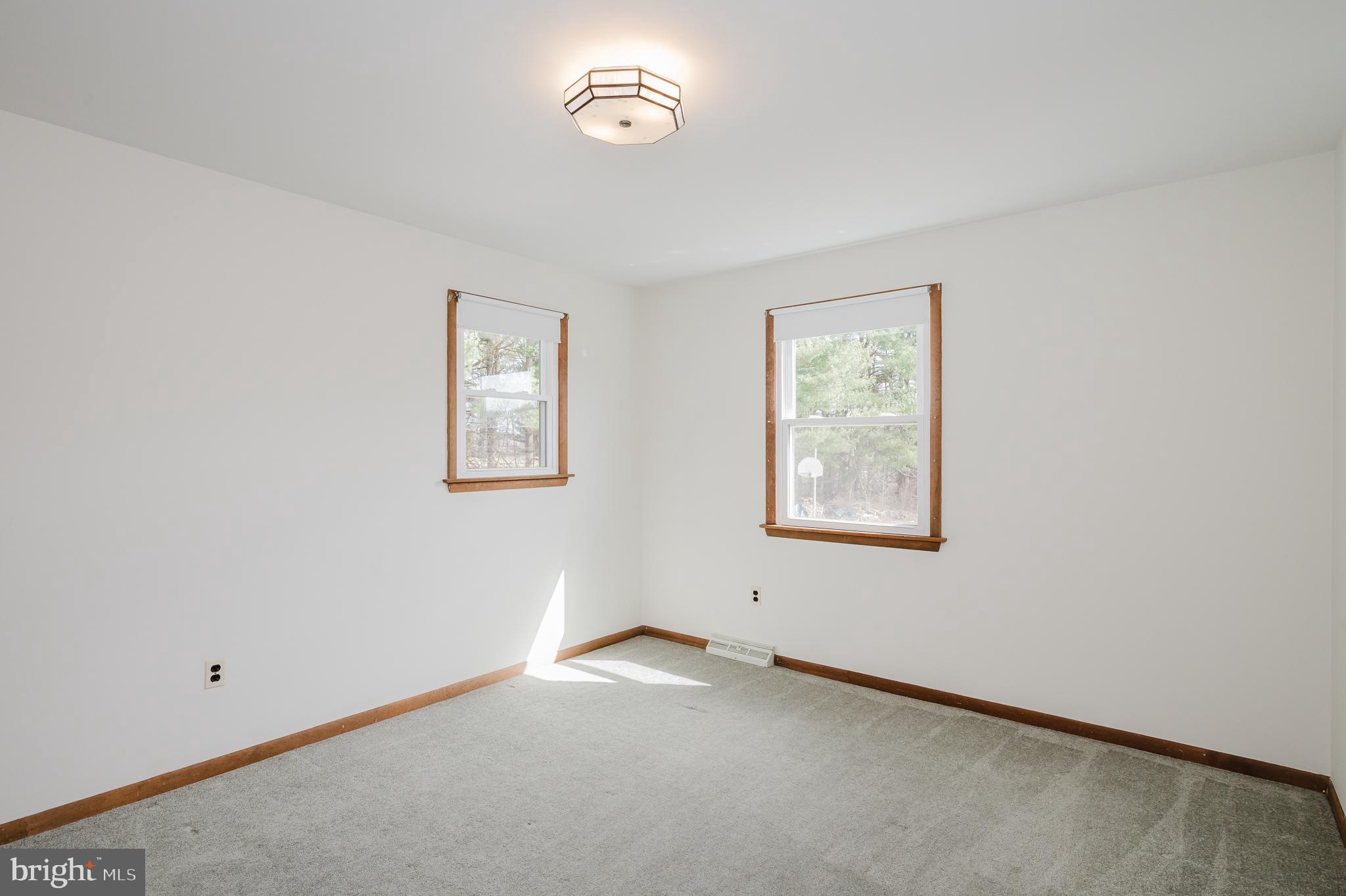 2713 Garrett Road White Hall, MD 21161 - Photo 46 of 60 an empty room with windows