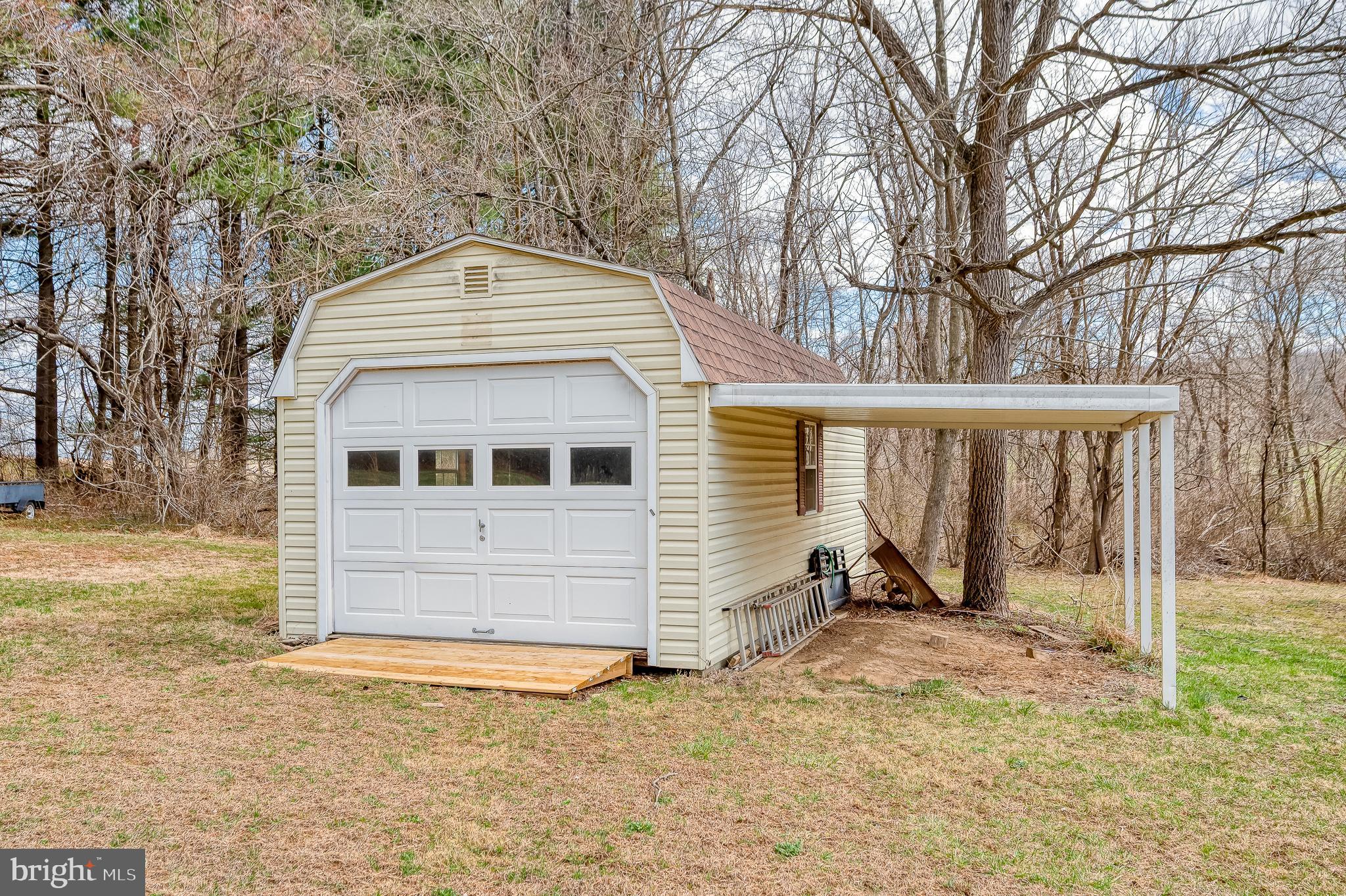 2713 Garrett Road White Hall, MD 21161 - Photo 57 of 60 a view of a house with a yard