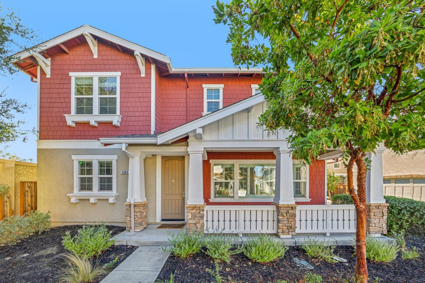 5889 Flora Common Livermore, CA 94551 - Photo 1 of 1 a front view of a house with garden