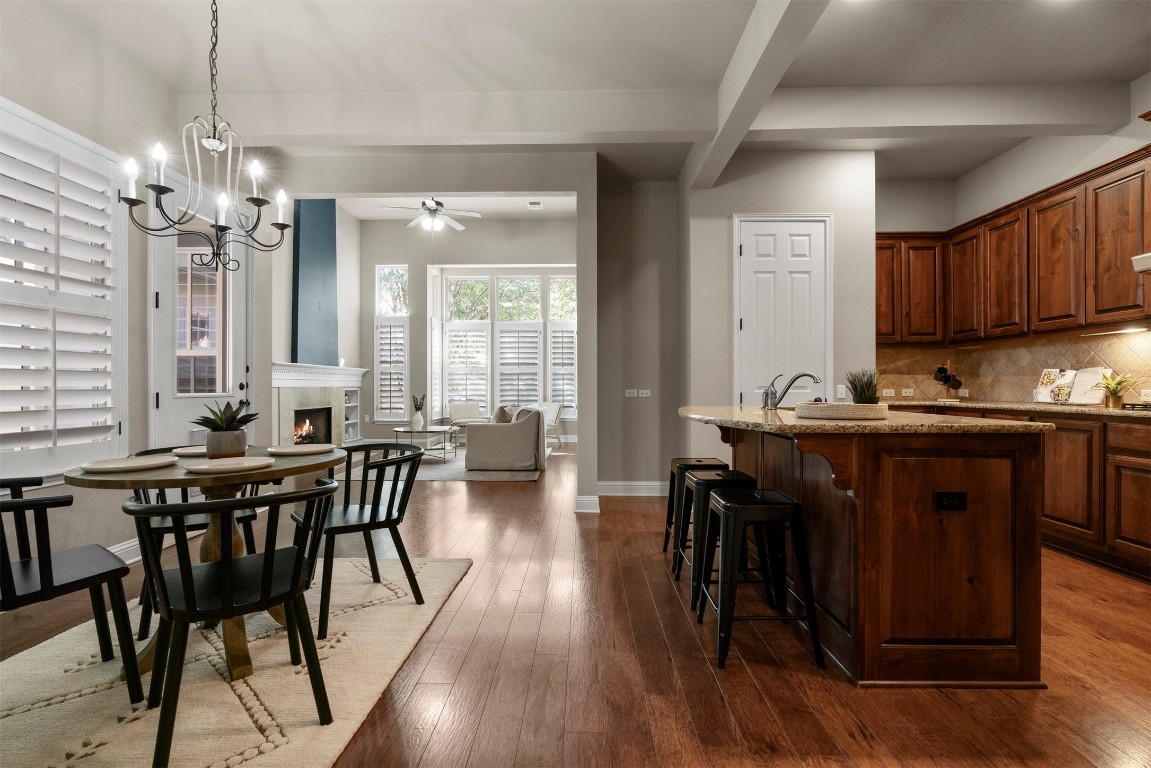 2020 Antone Street Austin, TX 78723 - Photo 18 of 35 a view of a dining room with furniture window and wooden floor