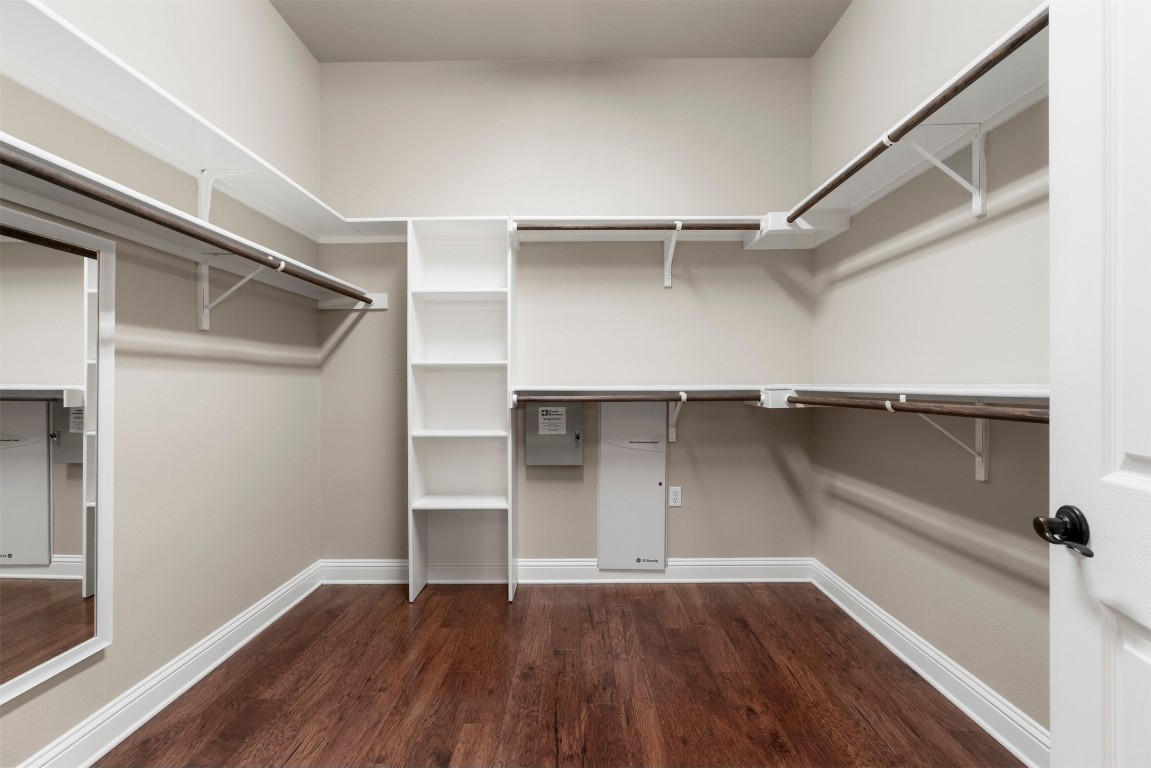 2020 Antone Street Austin, TX 78723 - Photo 25 of 35 a view of walk in closet with empty racks