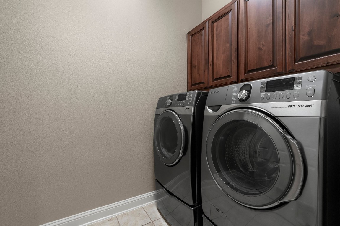2020 Antone Street Austin, TX 78723 - Photo 31 of 35 a utility room with dryer and washer