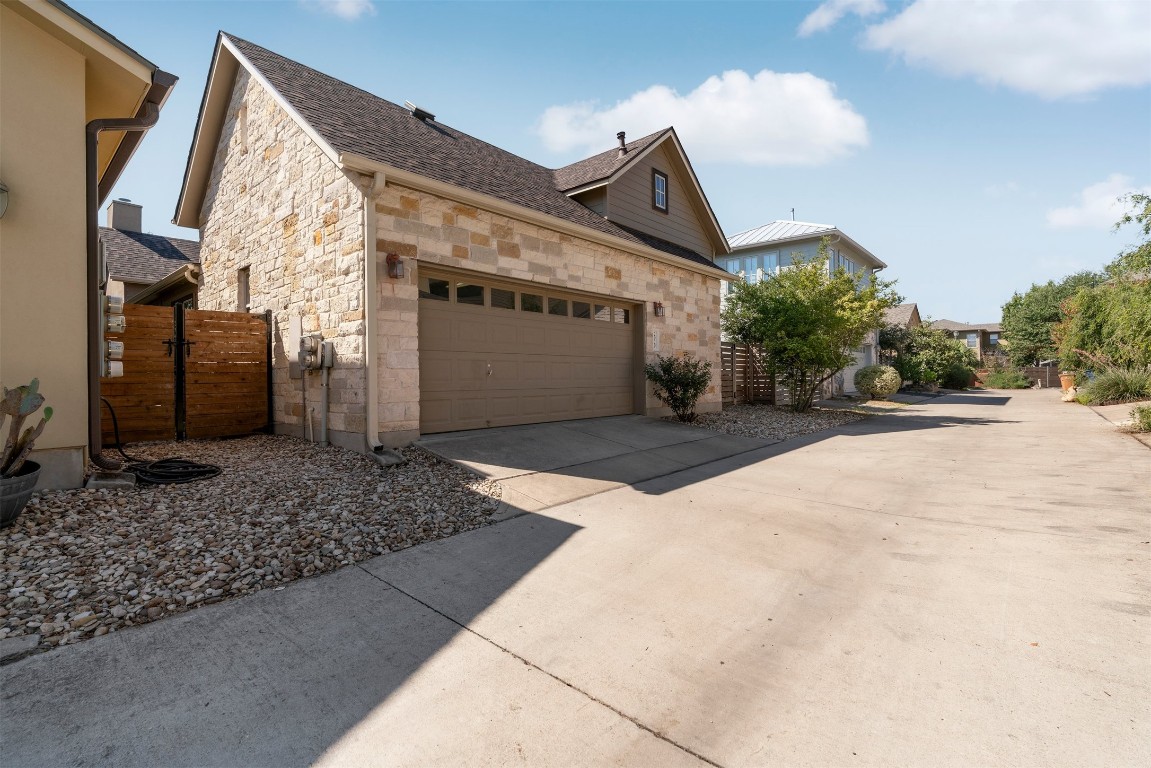 2020 Antone Street Austin, TX 78723 - Photo 34 of 35 a front view of a house with a yard