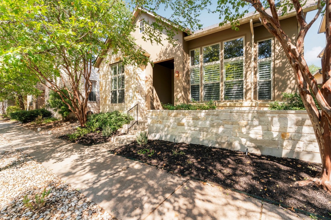 2020 Antone Street Austin, TX 78723 - Photo 9 of 35 a front view of a house with a yard