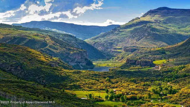 a view of a lake with a mountain in the background