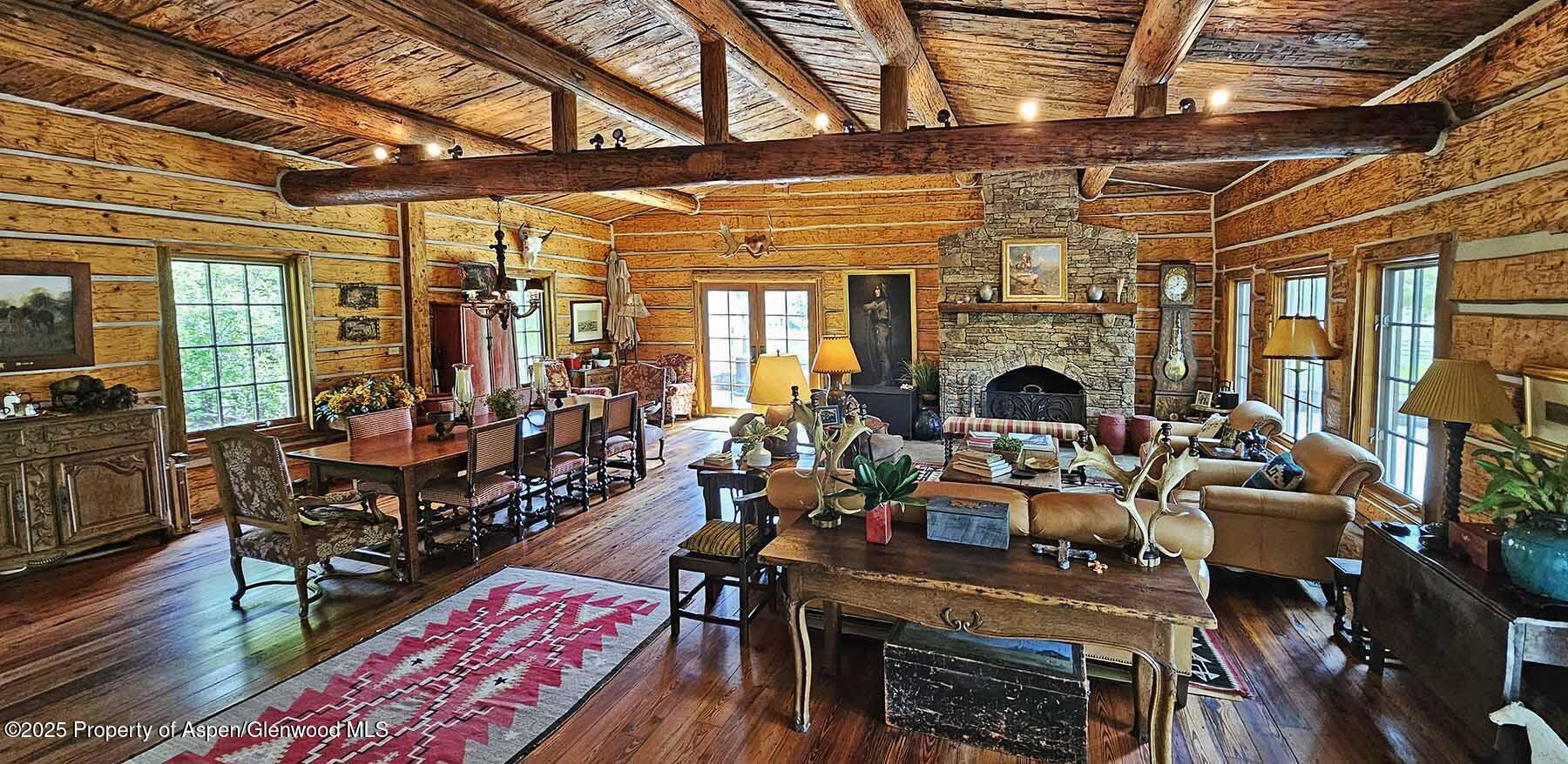 2650 Sweetwater Road Gypsum, CO 81637 - Photo 50 of 87 a living room with furniture oven and a fireplace