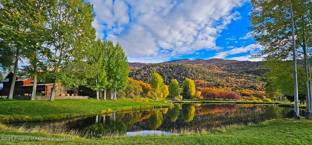 a view of a city with mountains in the background