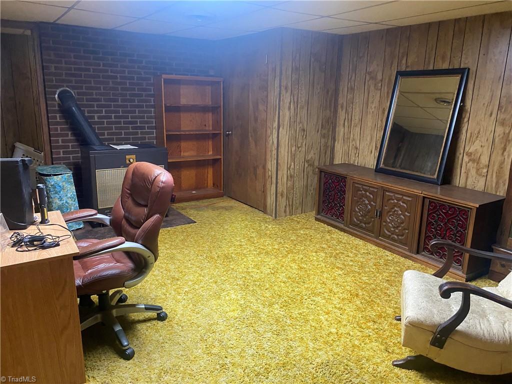 1104 Windover Road Randleman, NC 27317 - Photo 20 of 22 basement area includes wood stove