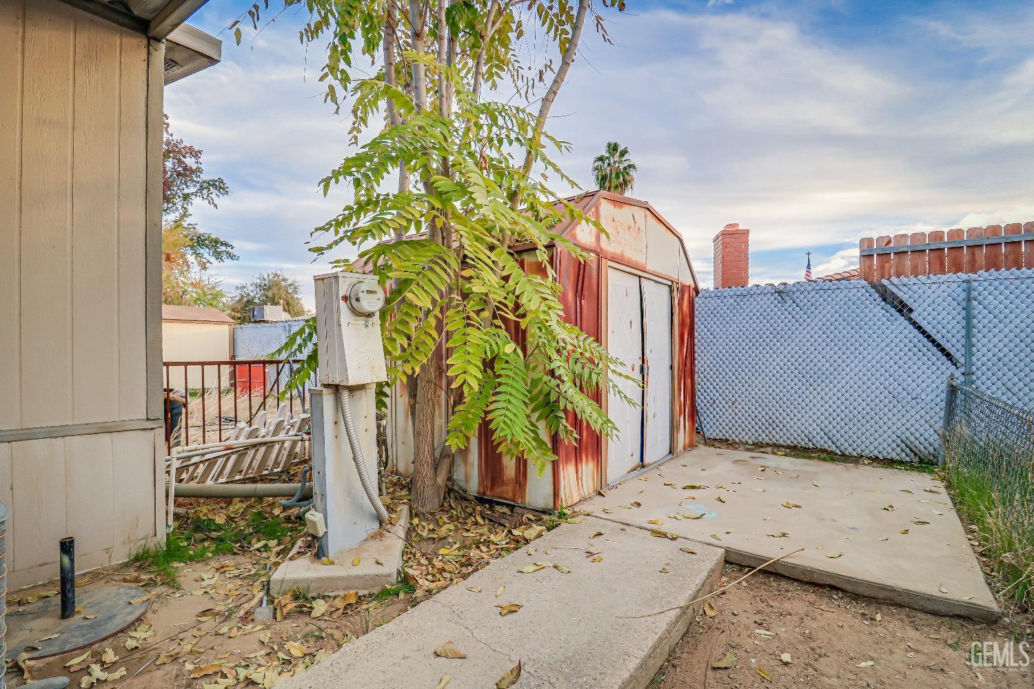 Undisclosed Address Bakersfield, CA 93312 - Photo 15 of 18 a view of a palm tree with dinning table
