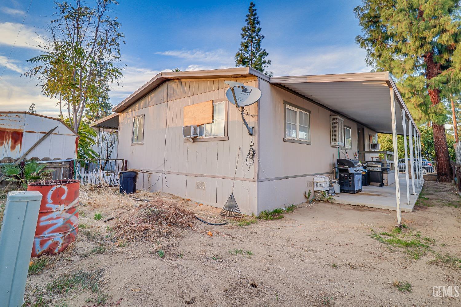 Undisclosed Address Bakersfield, CA 93312 - Photo 18 of 18 a view of a house with a yard