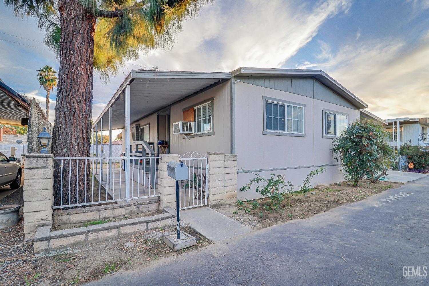 Undisclosed Address Bakersfield, CA 93312 - Photo 2 of 18 a house with a outdoor space