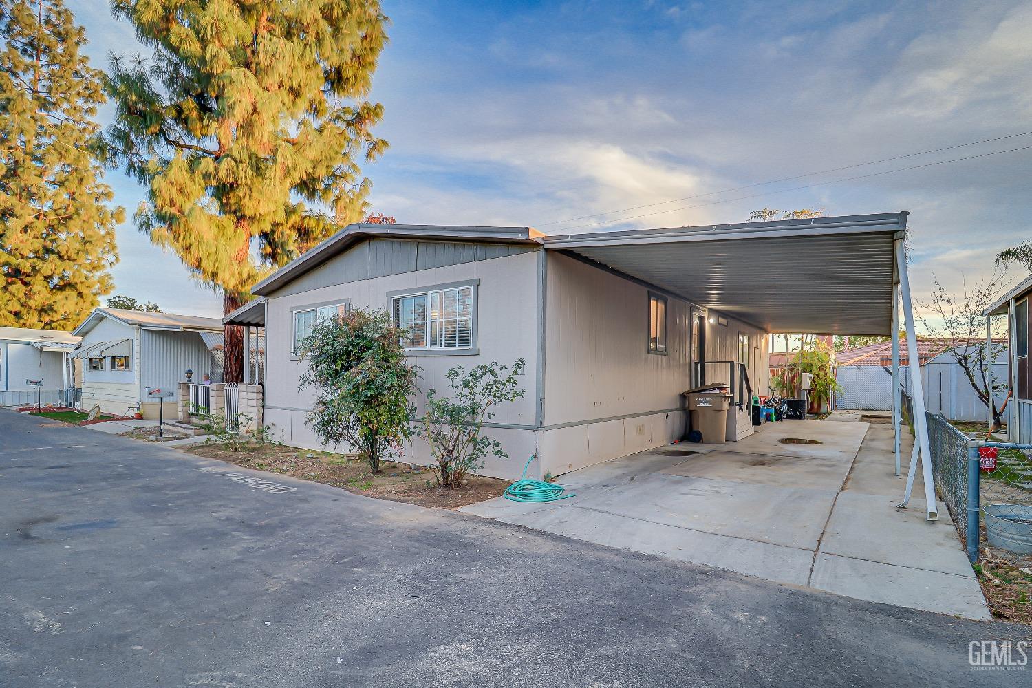 Undisclosed Address Bakersfield, CA 93312 - Photo 3 of 18 a view of a house with a patio