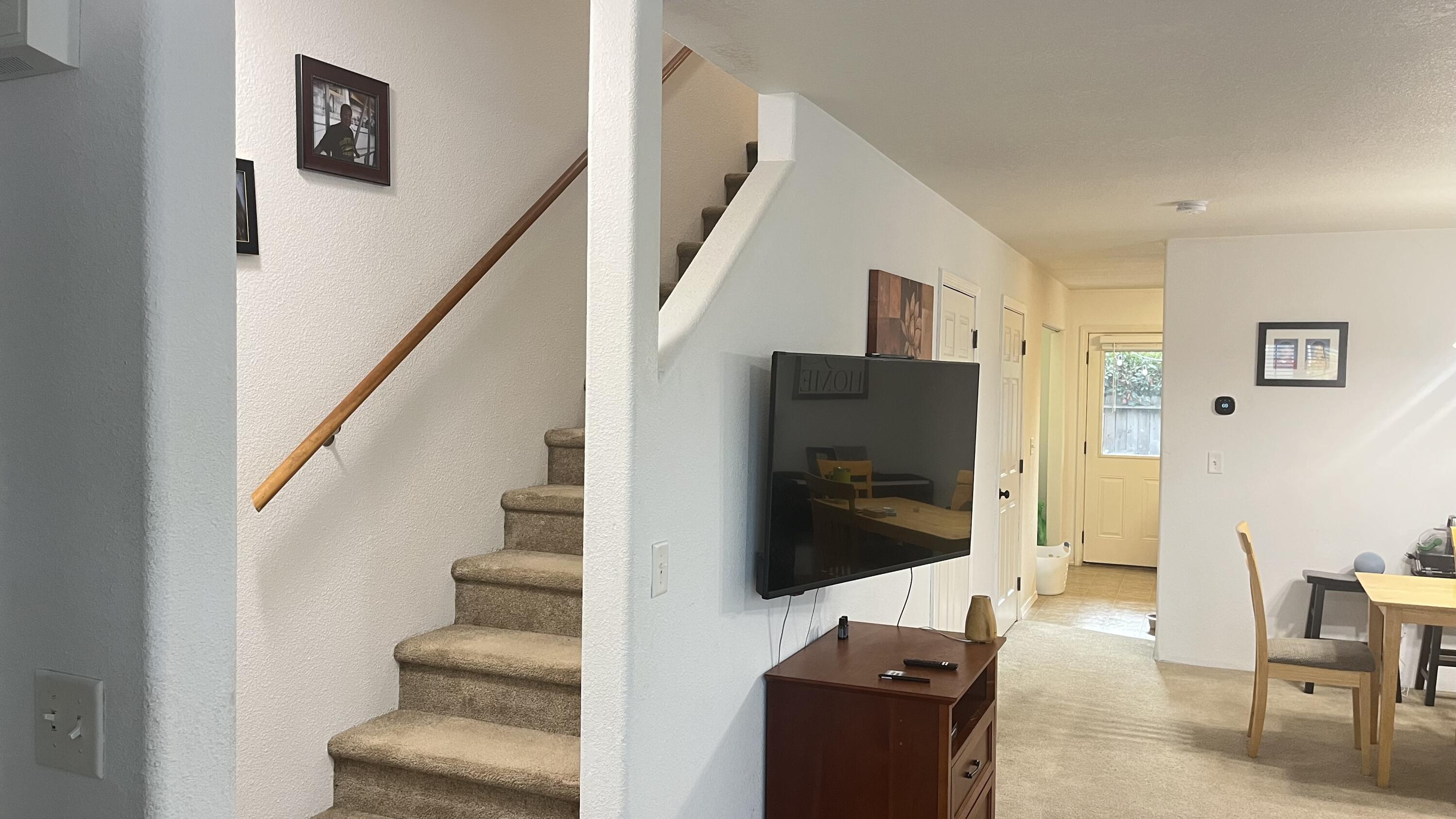 450 Midway Road, Unit 5 Medford, OR 97501 - Photo 23 of 46 a living room with furniture and a flat screen tv