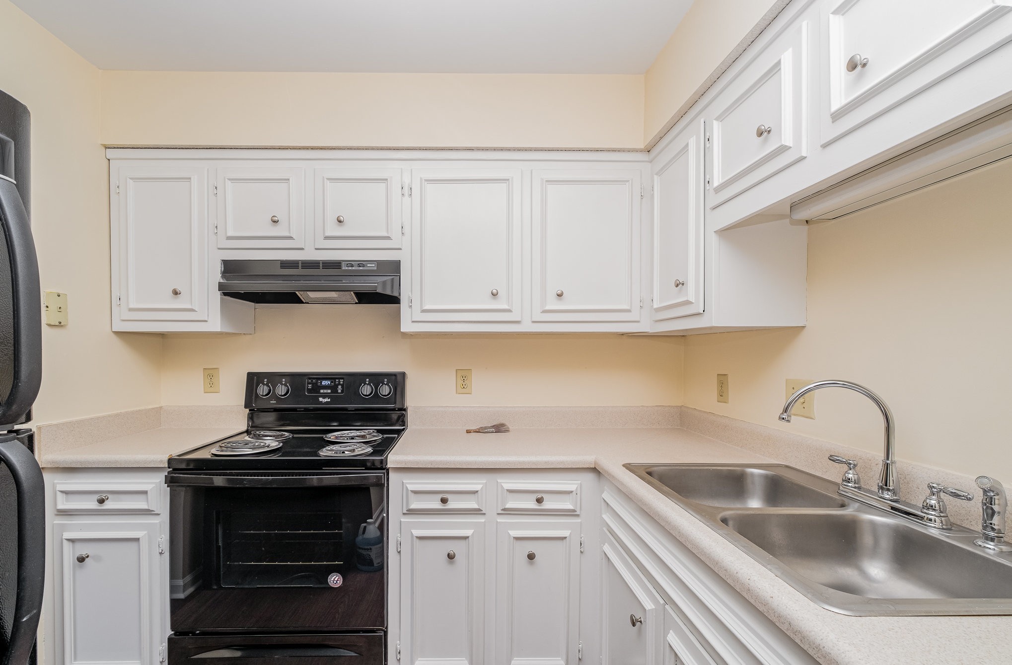 757 Fox Ridge Drive Brentwood, TN 37027 - Photo 11 of 21 a kitchen with stainless steel appliances granite countertop white cabinets a sink and dishwasher