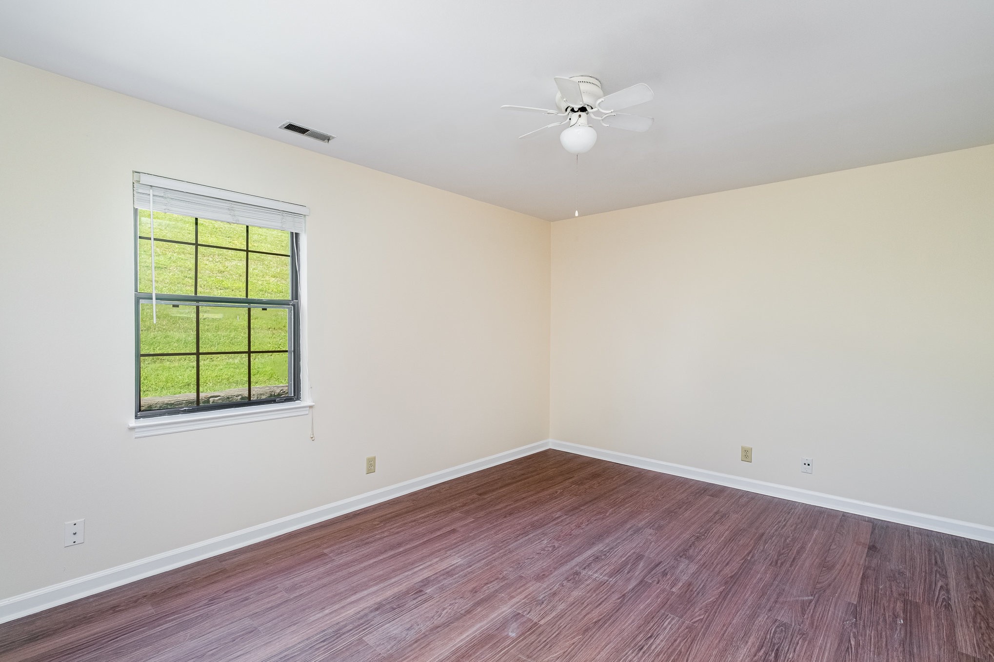 757 Fox Ridge Drive Brentwood, TN 37027 - Photo 12 of 21 wooden floor in an empty room with a window