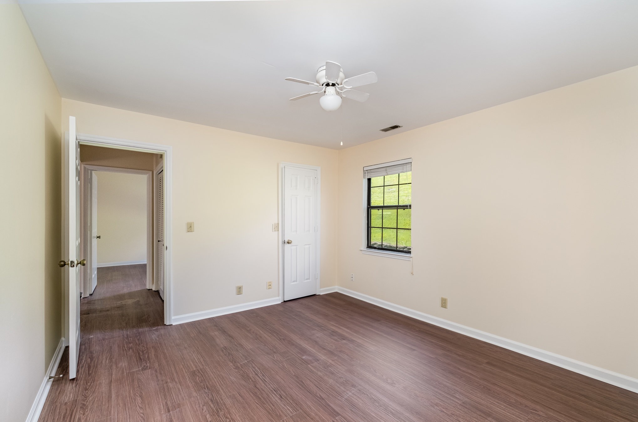 757 Fox Ridge Drive Brentwood, TN 37027 - Photo 13 of 21 wooden floor in an empty room with a window