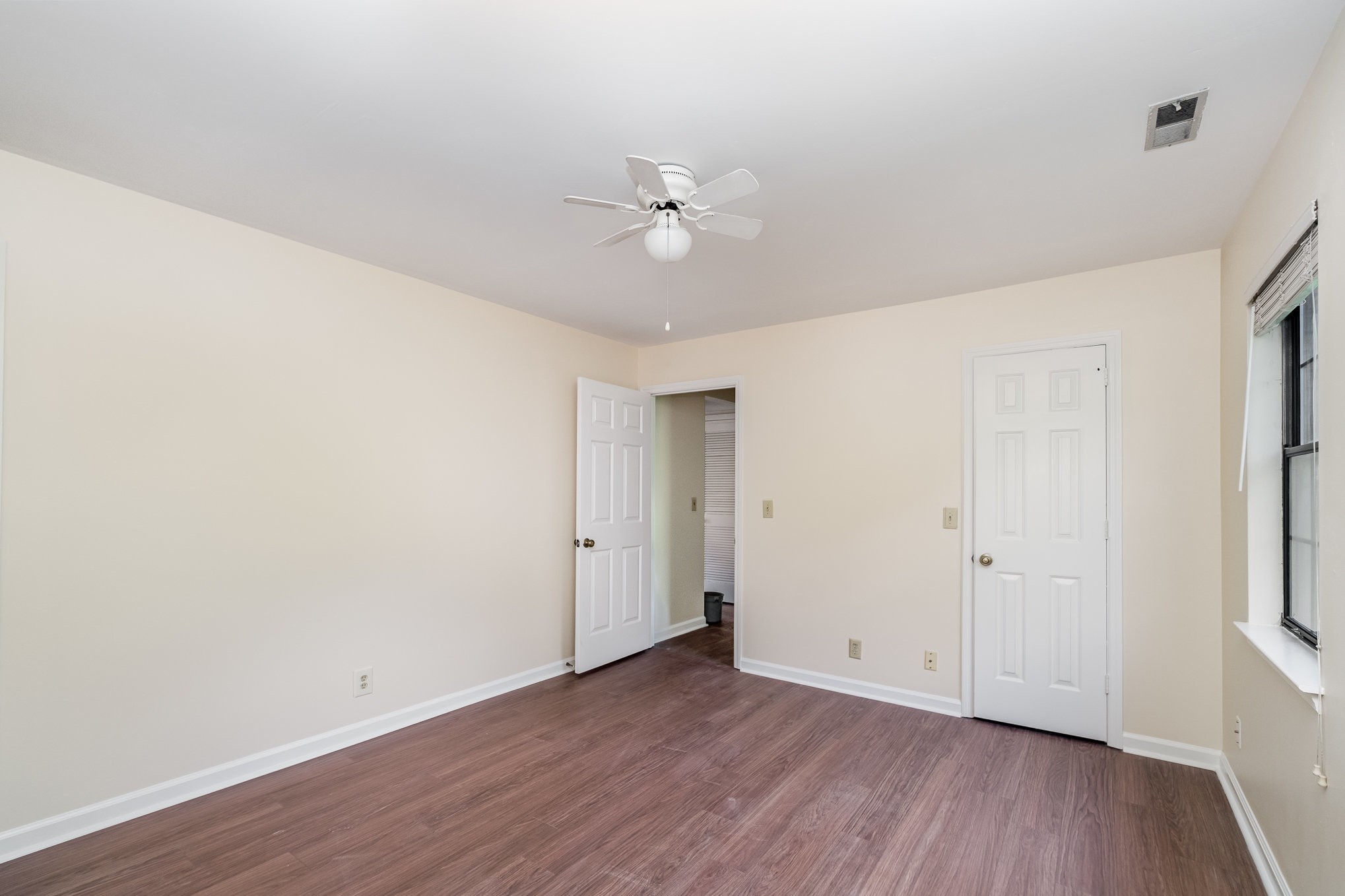 757 Fox Ridge Drive Brentwood, TN 37027 - Photo 17 of 21 an empty room with wooden floor ceiling fan and window