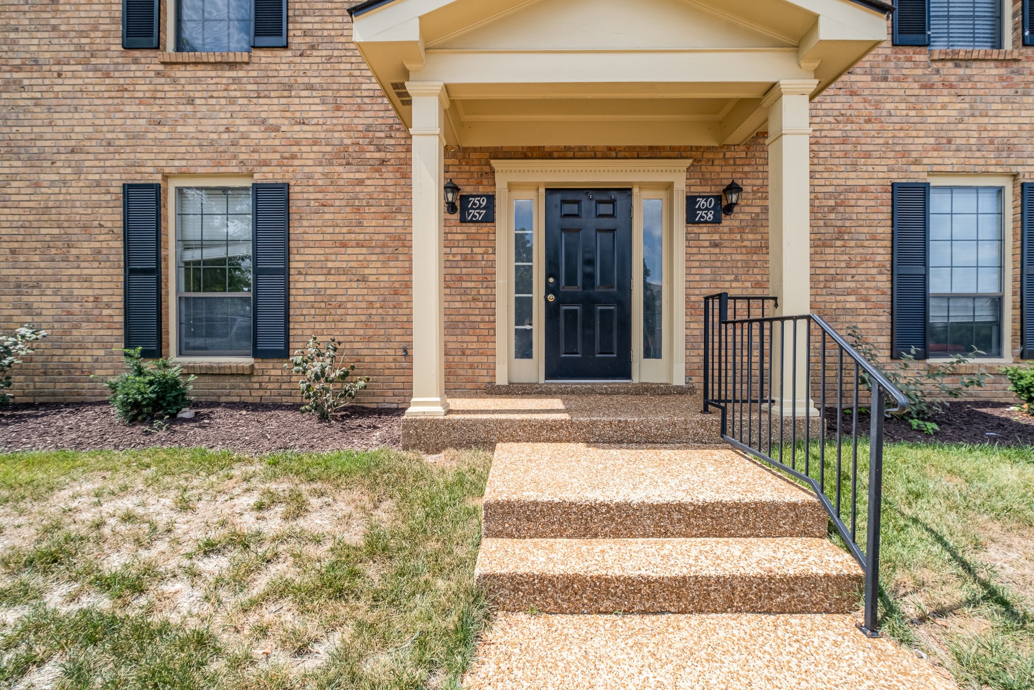 757 Fox Ridge Drive Brentwood, TN 37027 - Photo 2 of 21 a view of entrance front of house with a chair