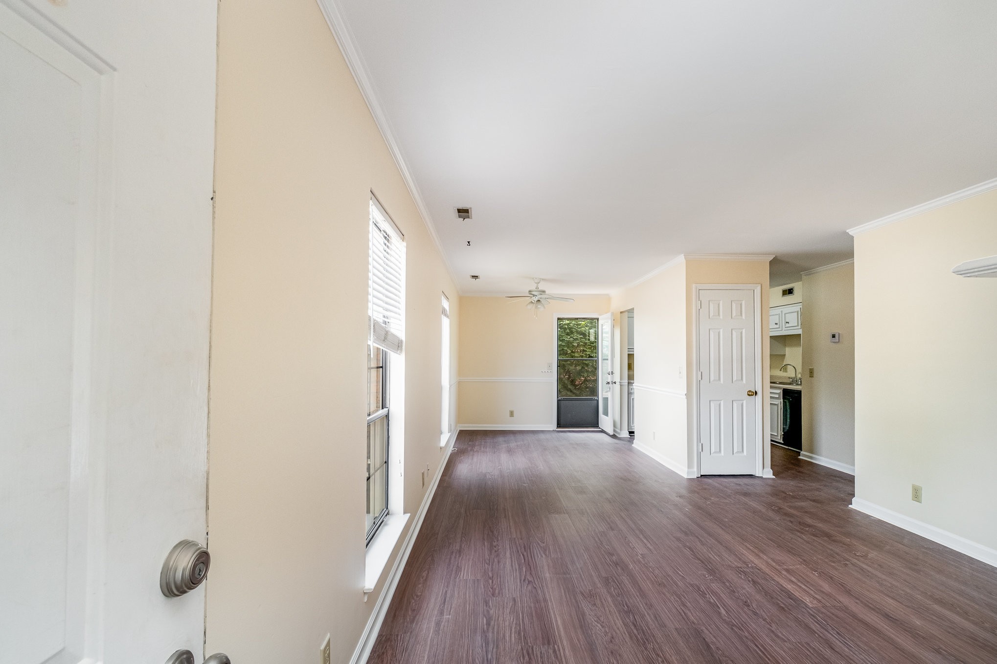 757 Fox Ridge Drive Brentwood, TN 37027 - Photo 3 of 21 a view of a hallway with wooden floor and a bathroom