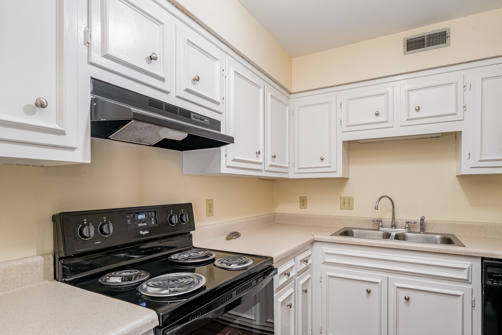 757 Fox Ridge Drive Brentwood, TN 37027 - Photo 9 of 21 a kitchen with white cabinets and appliances