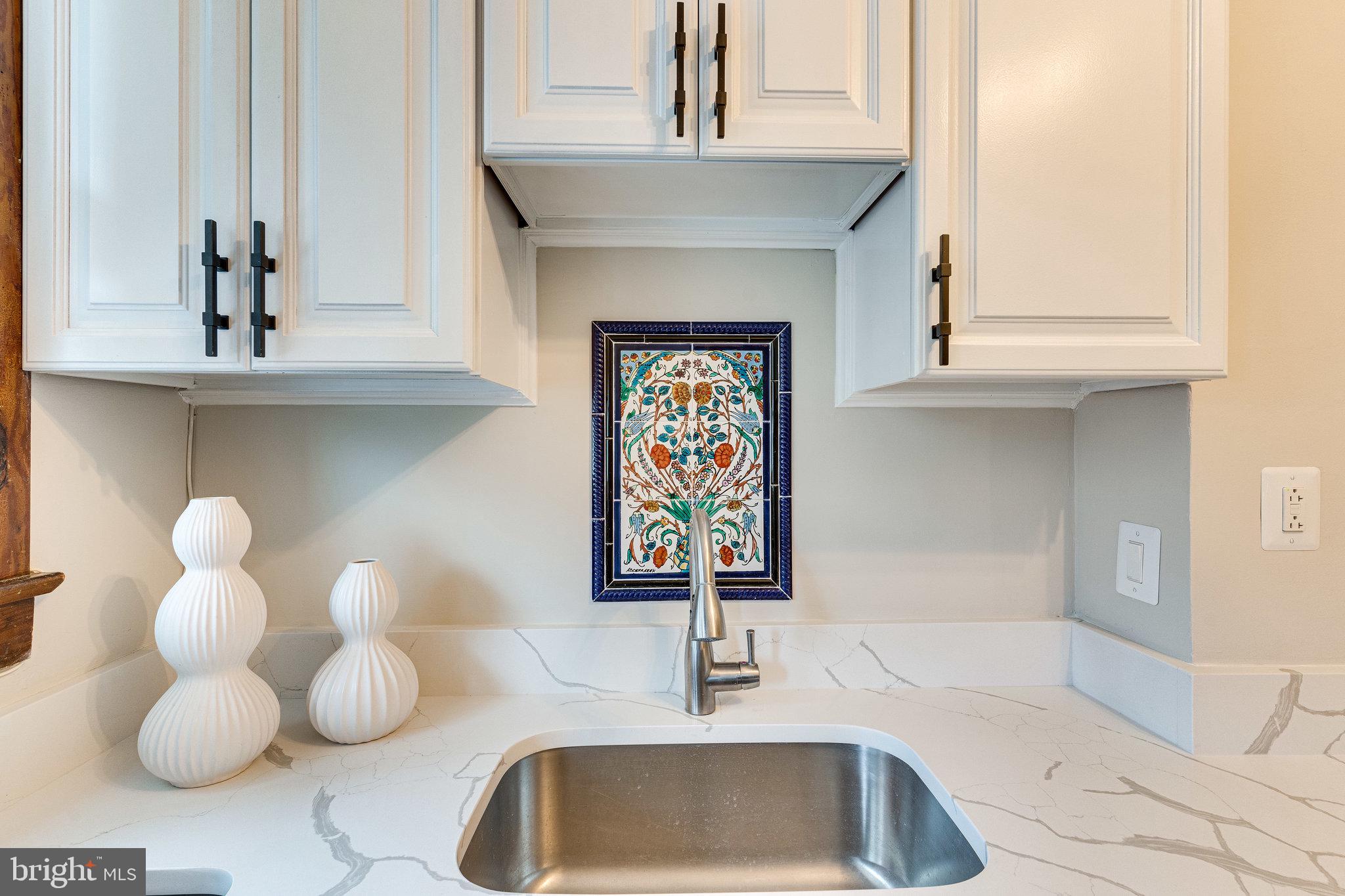 4215 7th Street Northwest Washington, DC 20011 - Photo 16 of 57 Custom, hand-laid mosaics adorn an undermount sink