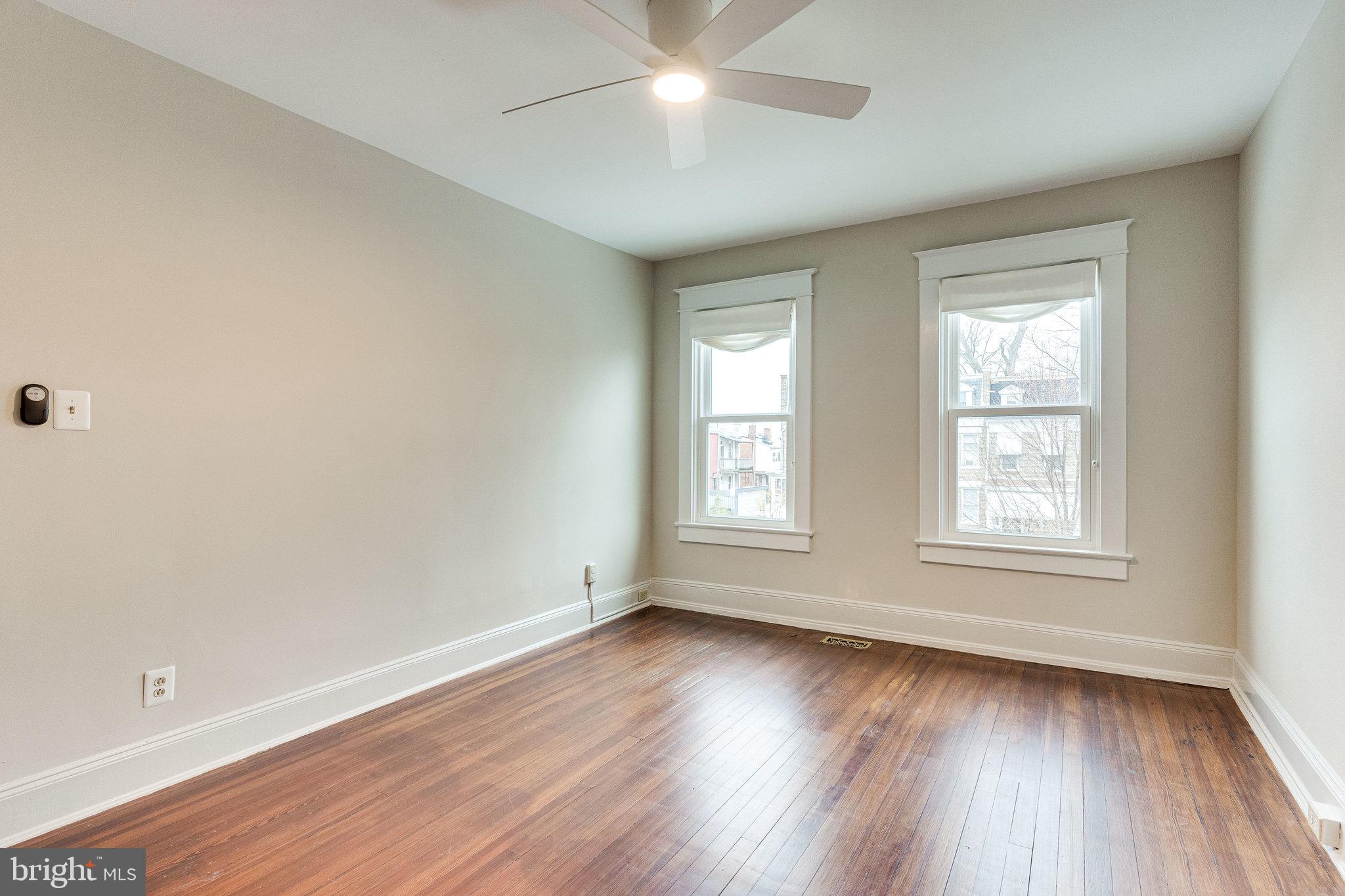 4215 7th Street Northwest Washington, DC 20011 - Photo 34 of 57 Oversized windows and new ceiling fan