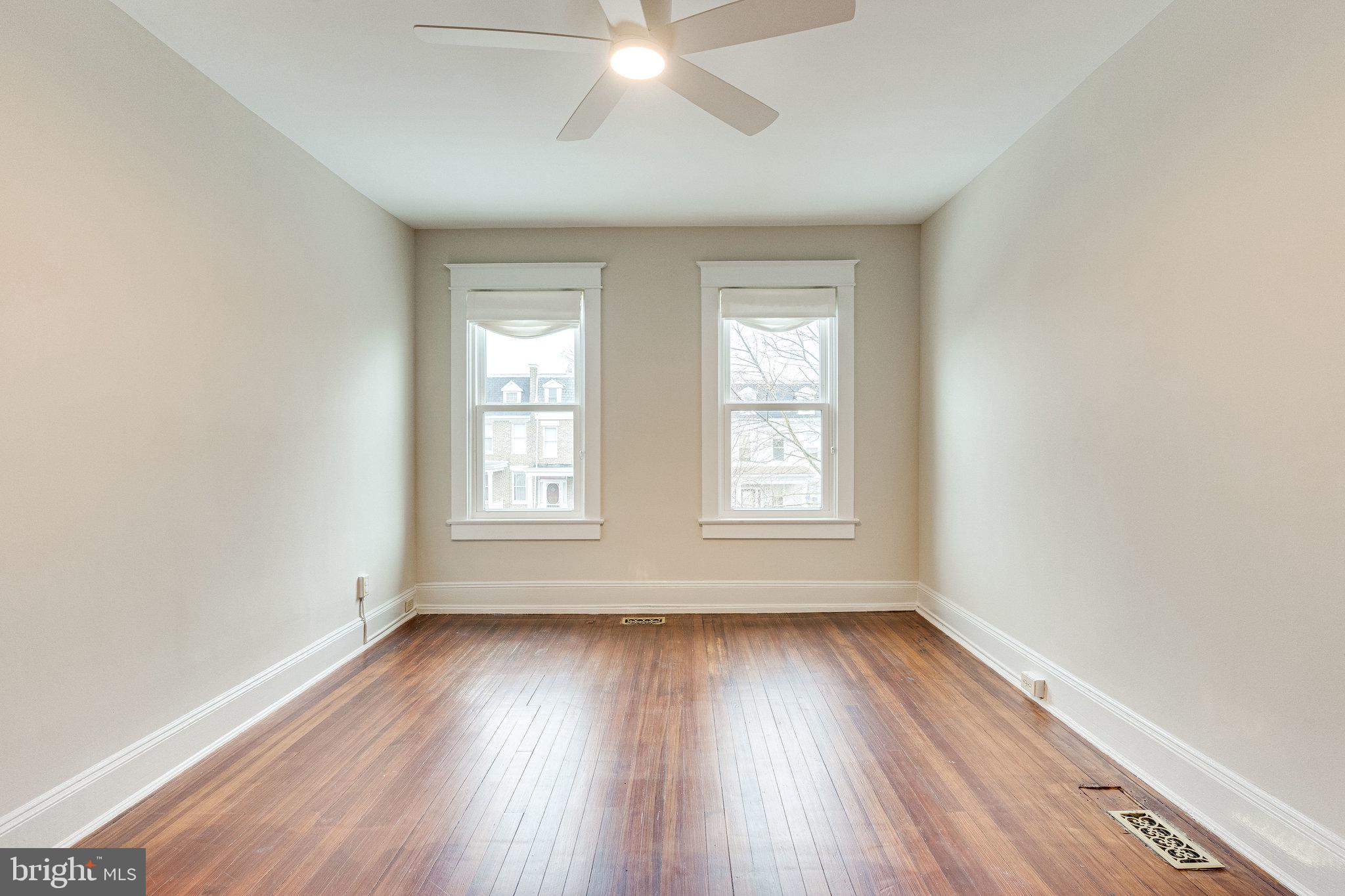 4215 7th Street Northwest Washington, DC 20011 - Photo 35 of 57 Oversized windows and a new ceiling fan