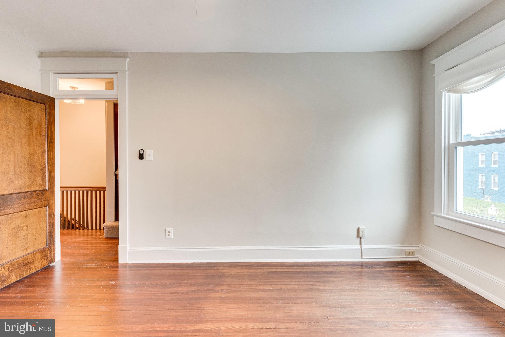 4215 7th Street Northwest Washington, DC 20011 - Photo 36 of 57 Oversized windows and a new ceiling fan