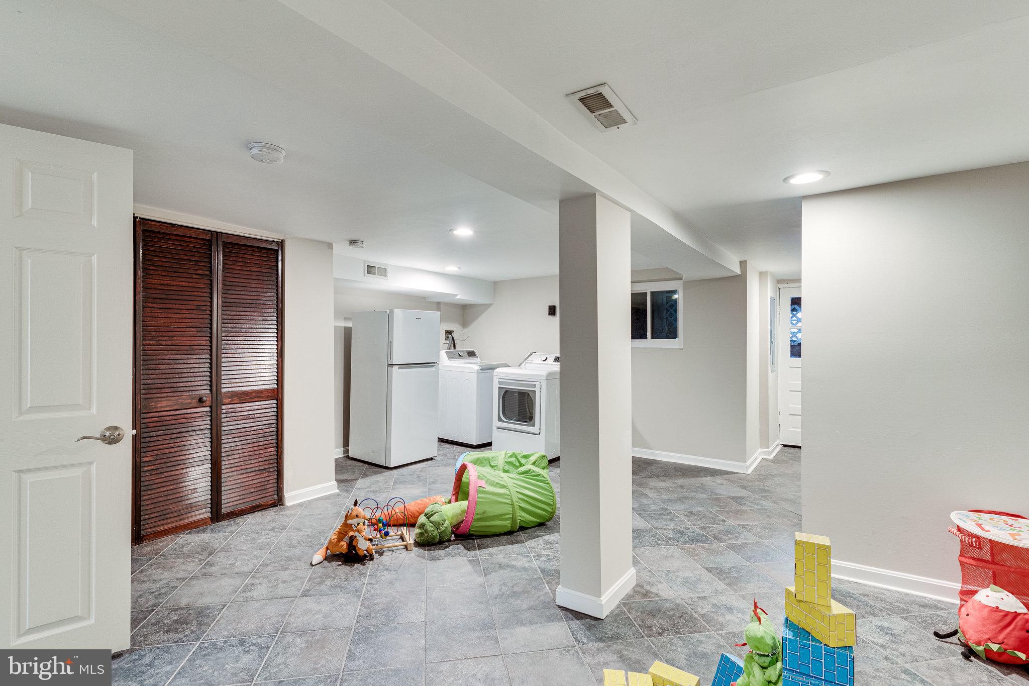 4215 7th Street Northwest Washington, DC 20011 - Photo 46 of 57 Finished basement with ceramic tile flooring