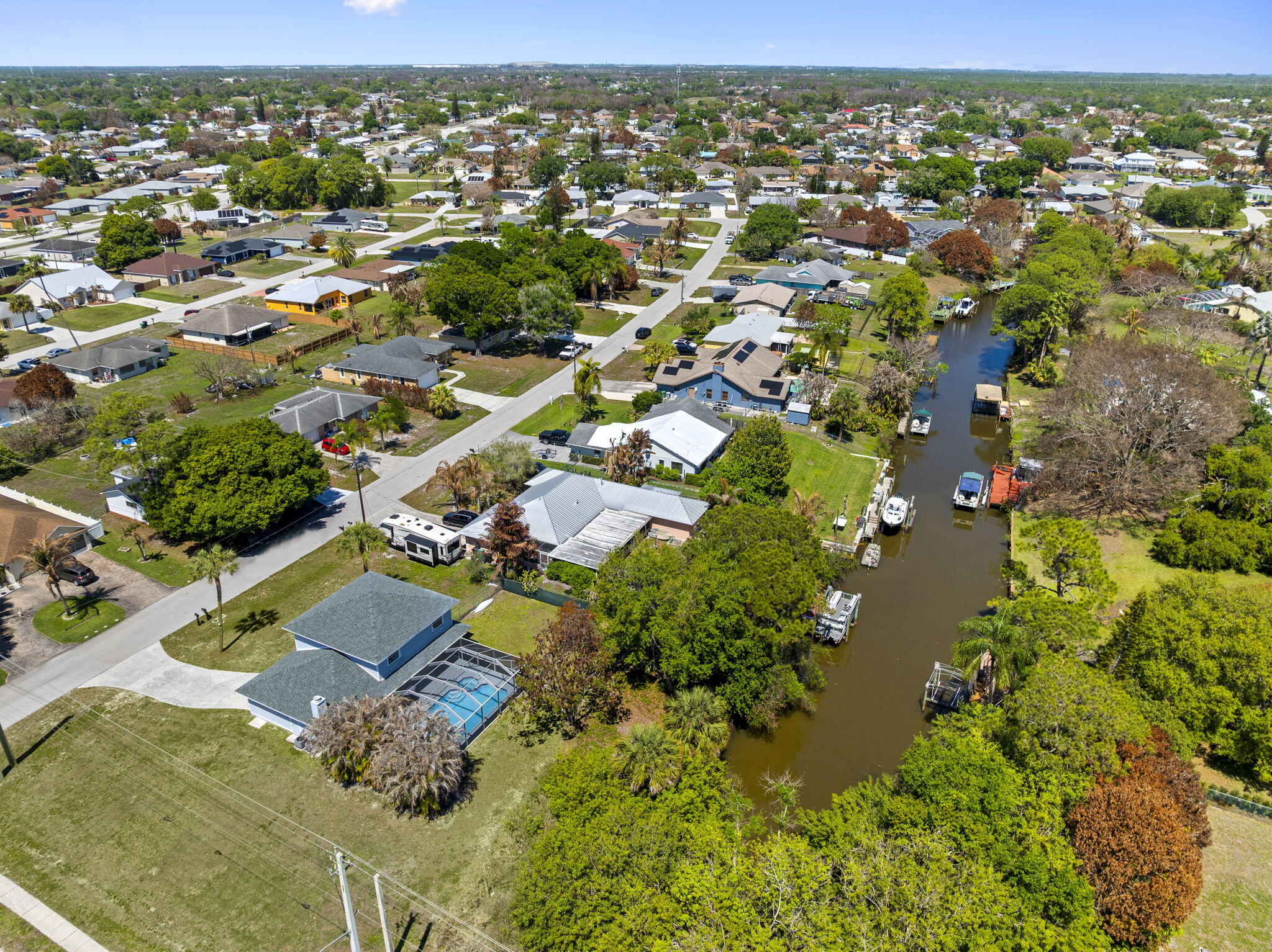 405 Northeast Midvale Street Port St. Lucie, FL 34983 - Photo 8 of 60 Backyard St. Lucie River Drone Shot (3)
