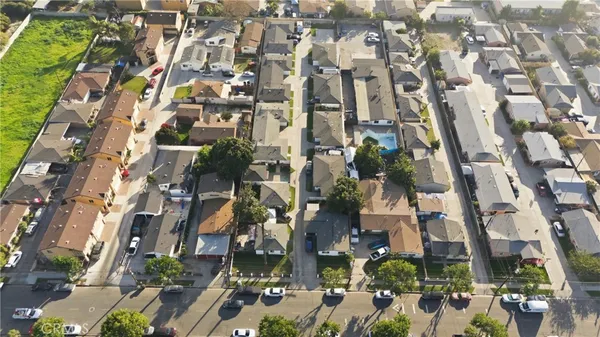 a view of a car park in front of house