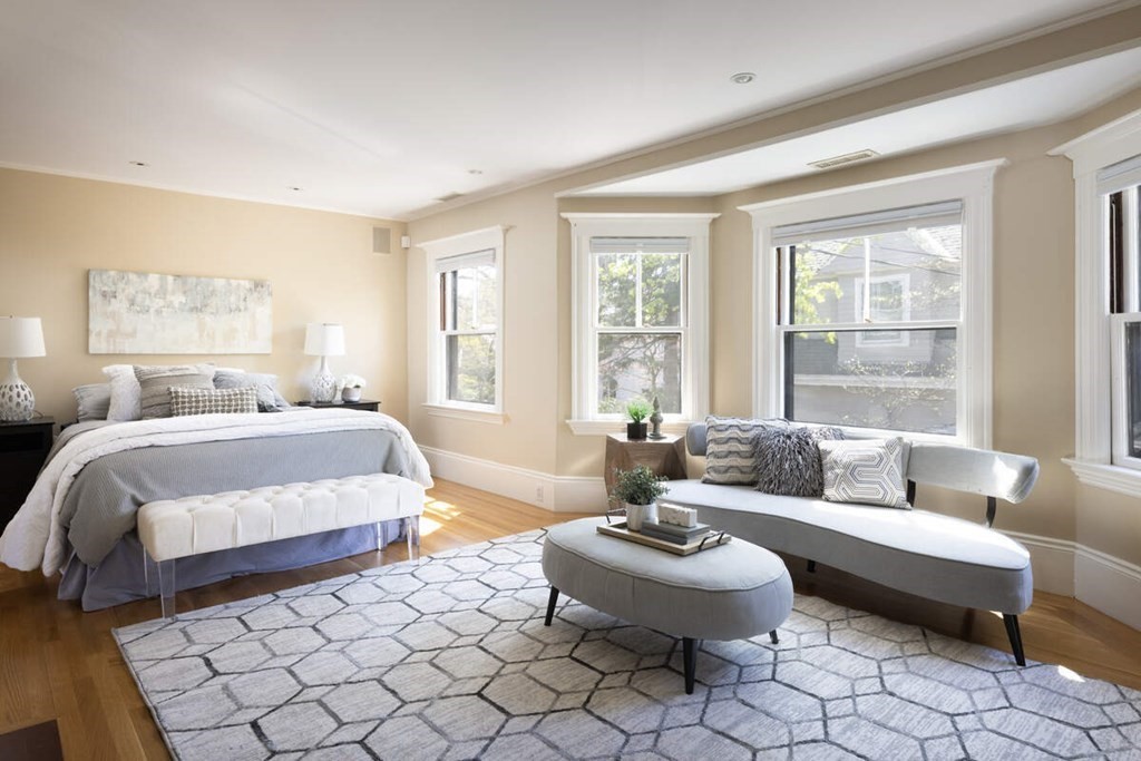 12 Balcarres Road Newton, MA 02465 - Photo 11 of 22 a spacious bedroom with a bed and a couch