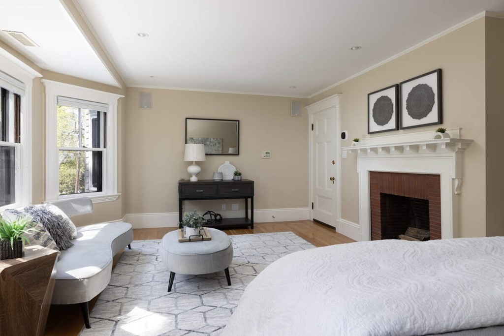 12 Balcarres Road Newton, MA 02465 - Photo 12 of 22 a living room with furniture a window and a fireplace