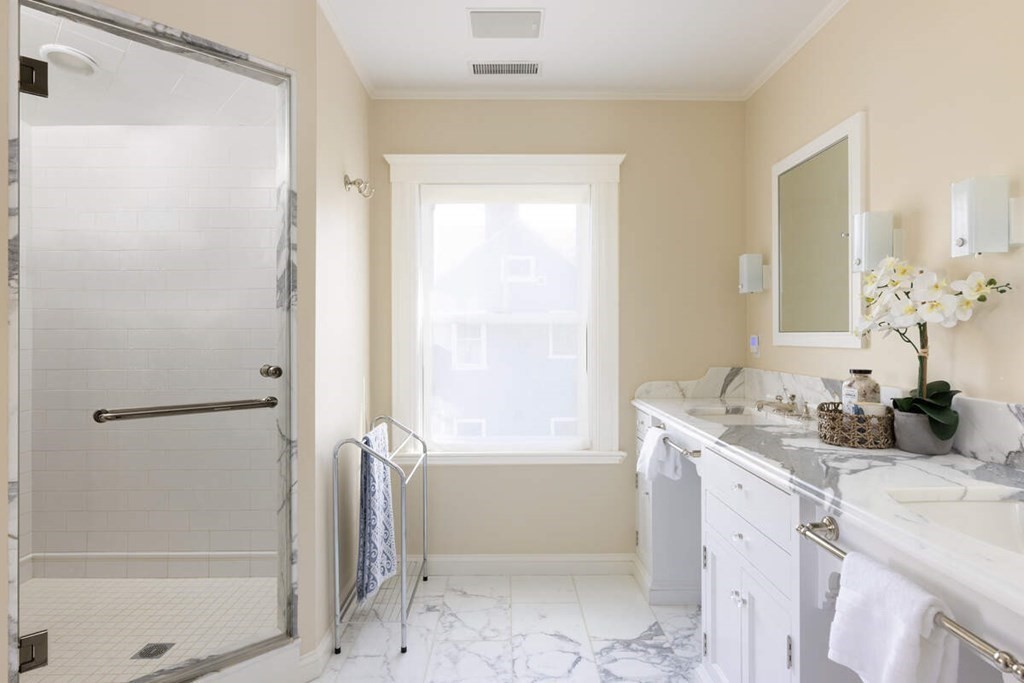 12 Balcarres Road Newton, MA 02465 - Photo 13 of 22 a bathroom with a granite countertop sink a toilet and shower