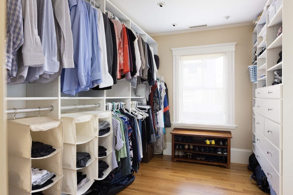 12 Balcarres Road Newton, MA 02465 - Photo 14 of 22 a view of walk in closet with clothes and shoes