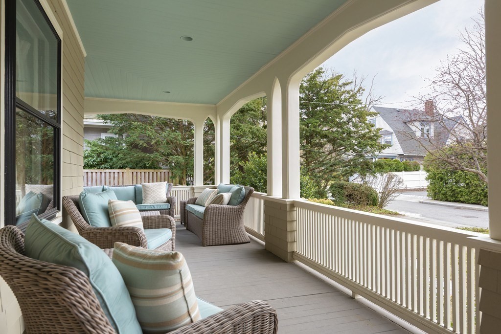 12 Balcarres Road Newton, MA 02465 - Photo 2 of 22 a balcony with furniture and a large window