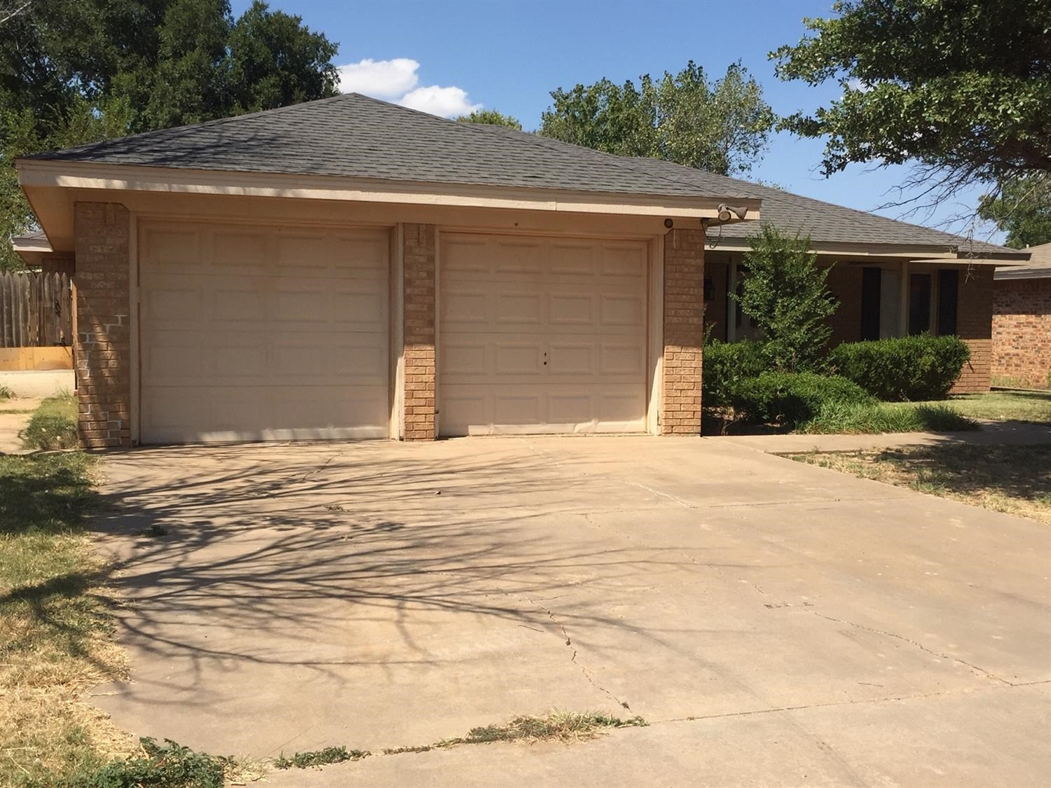 5708 91st Street Lubbock, TX 79424 - Photo 2 of 16 a front view of house with yard