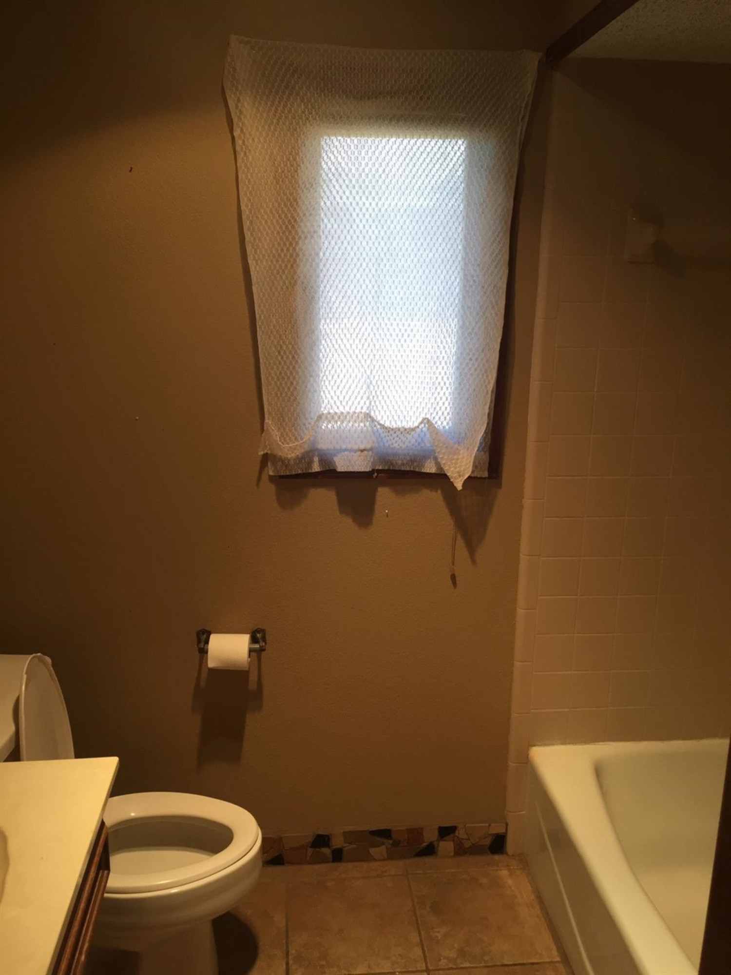 5708 91st Street Lubbock, TX 79424 - Photo 9 of 16 a bathroom with a toilet and a sink