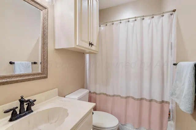 an aerial view of a house with a ocean view