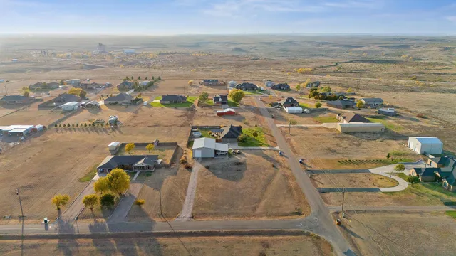 a room with gym equipment and a table