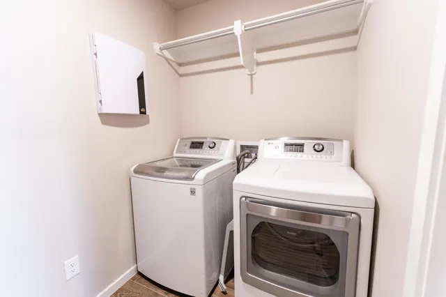 a utility room with dryer and washer