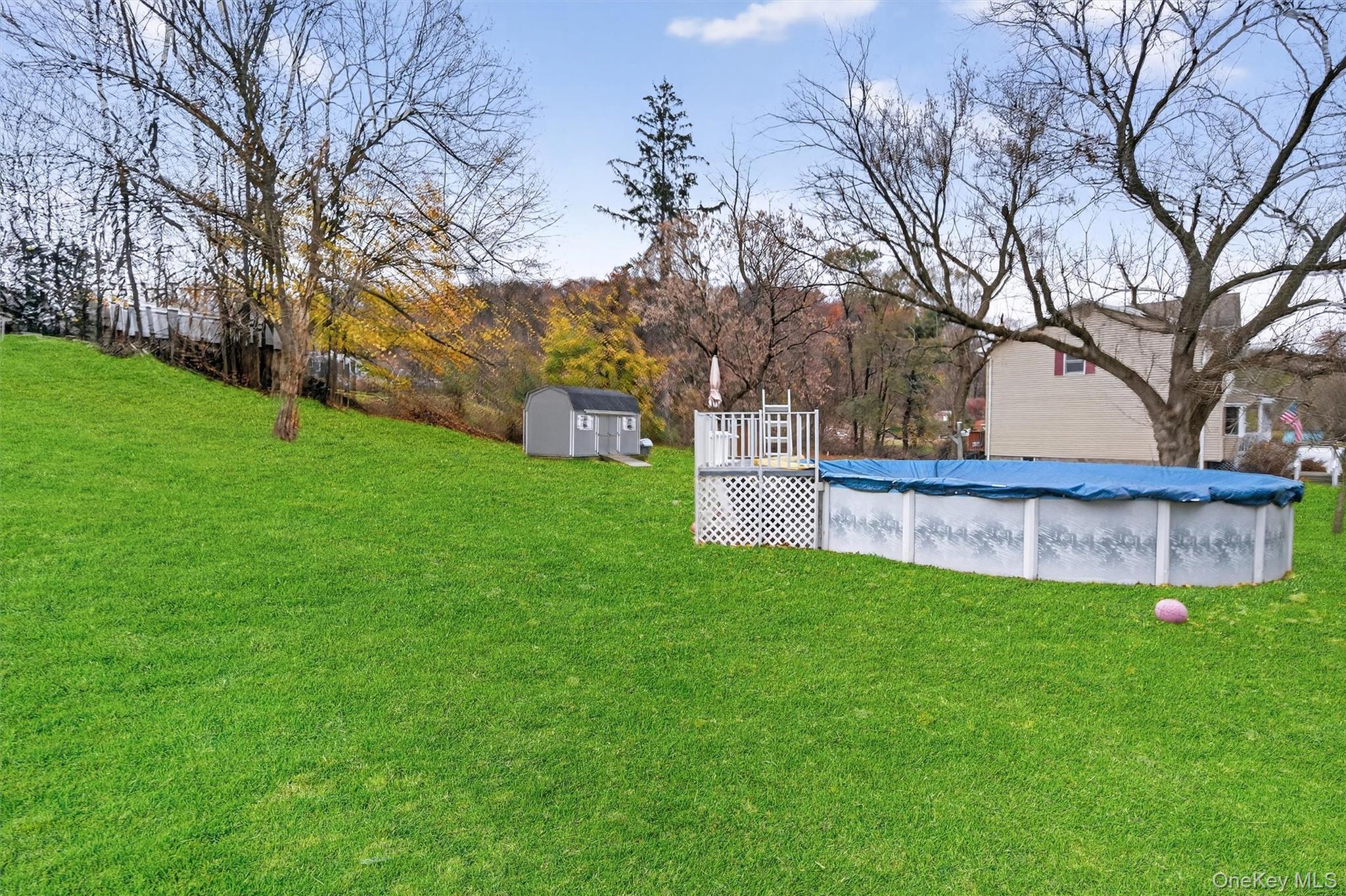 493 Gate Hill Coop Road Stony Point, NY 10980 - Photo 30 of 33 a view of a house with a yard