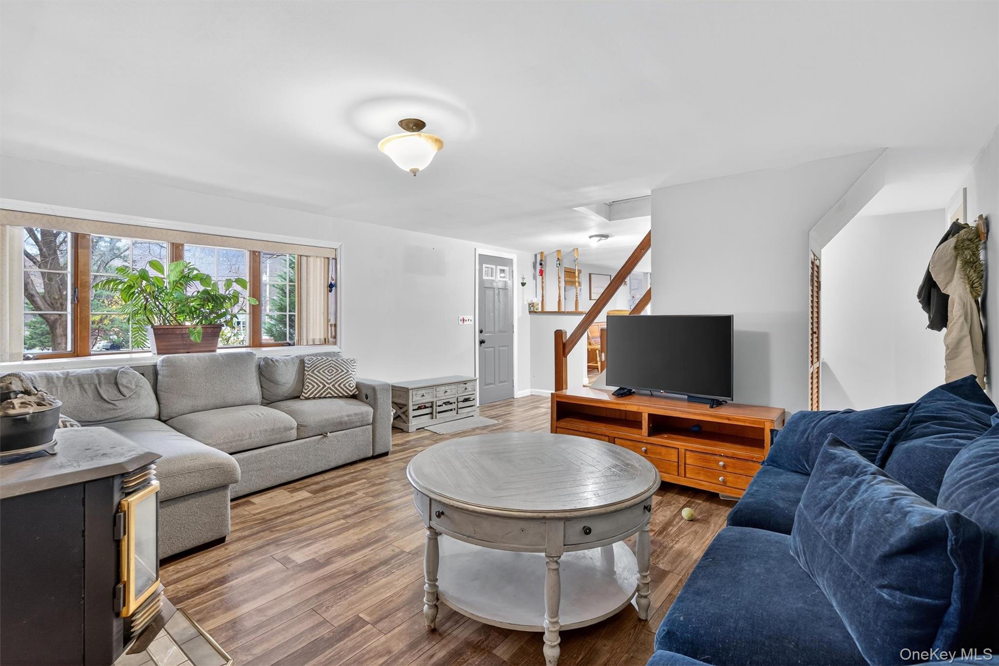 493 Gate Hill Coop Road Stony Point, NY 10980 - Photo 10 of 33 a living room with furniture and a flat screen tv