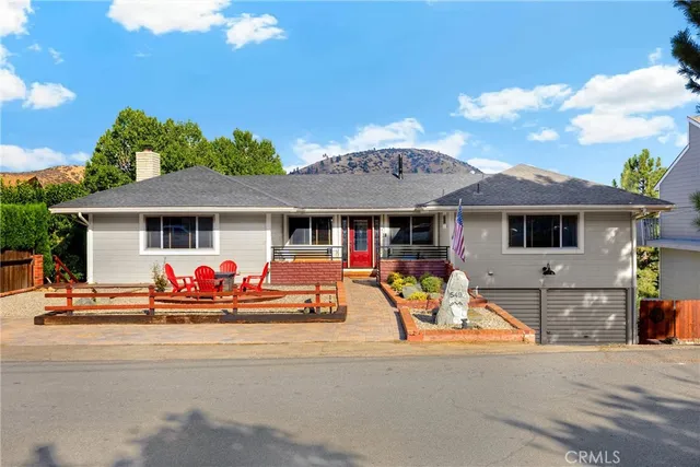 a view of a house with sitting area and furniture