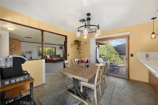 a kitchen with a sink a stove and a window