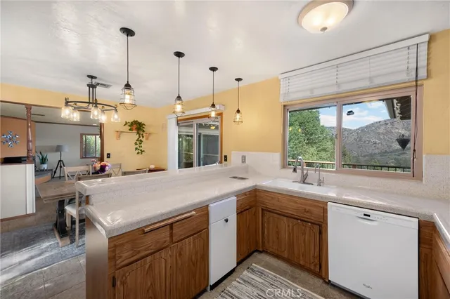 a spacious bedroom with a bed couch and a window