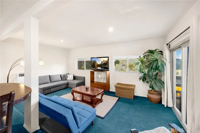 a bathroom with a glass shower door and a shower