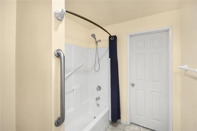 a view of a livingroom with furniture and a window